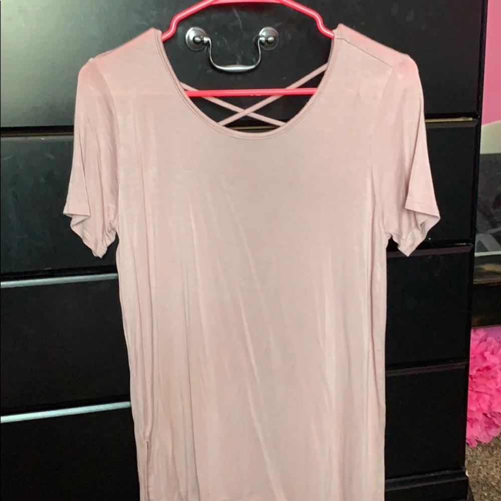 light pink flowy open back shirt